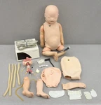 Laerdal Simbaby Training Manikin W/ Link Box 380100 & Accessories Used. Price: $495.00.