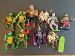 Teenage Mutant Ninja Turtles Action Figures And Carrying Case Used. Price: $84.00.